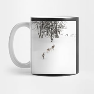 Reindeer in the snow Mug